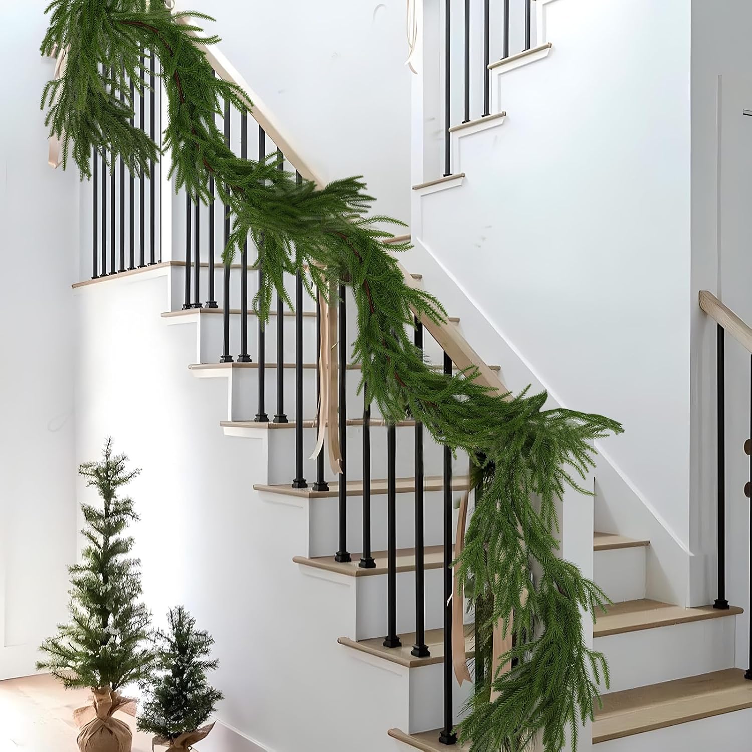 6-foot artificial Norfolk Pine garland featuring realistic-touch winter pine foliage.